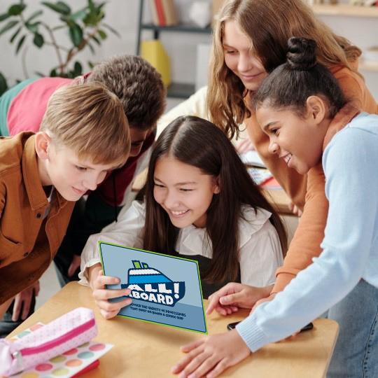 Image of children looking at the All Aborad game