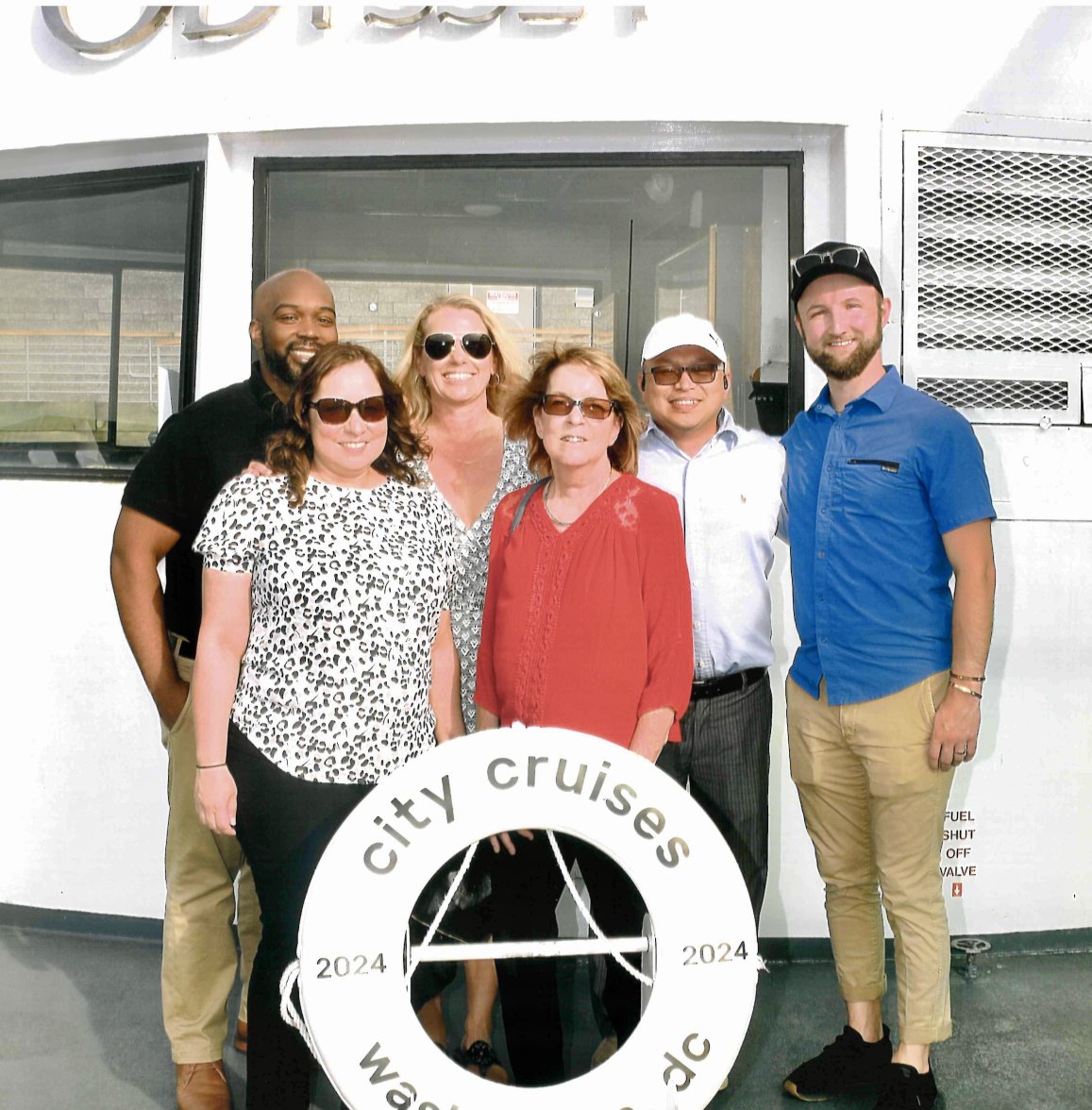 A CLIA team posing for a team retreat picture