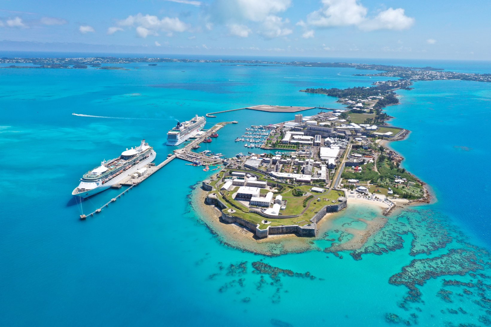 ships docked at an island