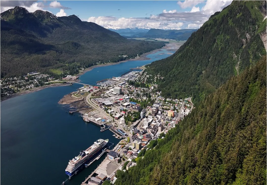 Image of Juneau with a cruise ship docked, and a bird's eye view of downtown